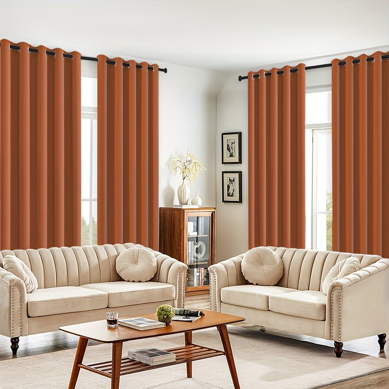 Living room with beige sofas, a wooden coffee table, and orange curtains.