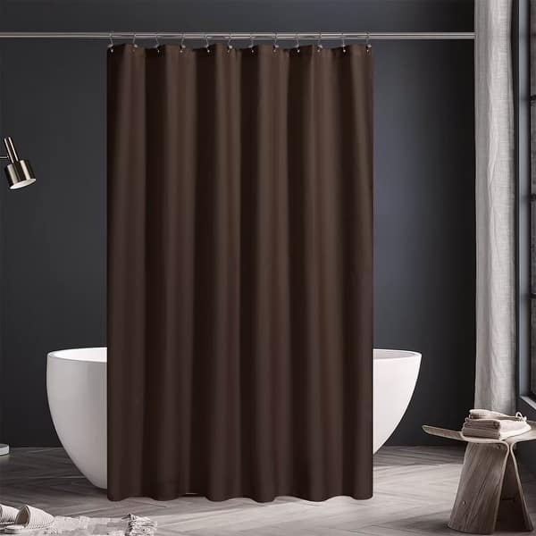 Brown shower curtain in a bathroom setting with a bathtub and stool.