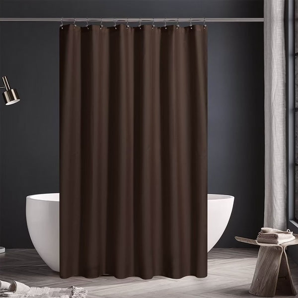 Brown shower curtain in a bathroom setting with a bathtub and stool.