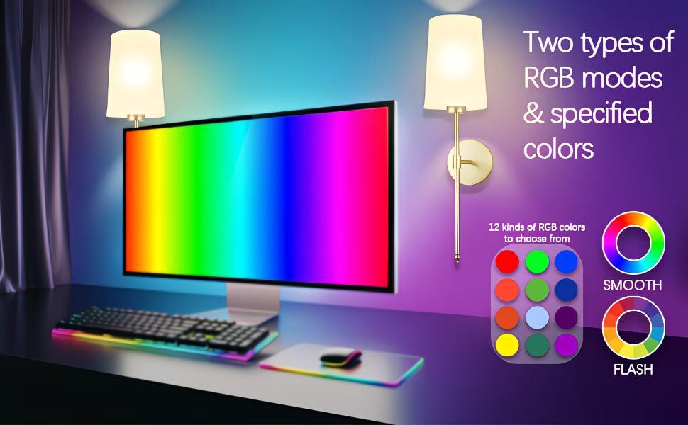 Computer monitor with RGB display, keyboard, and smartphone on a desk with colorful lighting effects.