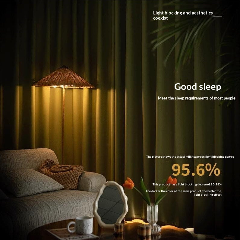 Cozy living room with a lamp and text about light blocking and sleep quality.