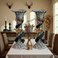 Decorative vases with floral designs on a table in a room with furniture and decor.