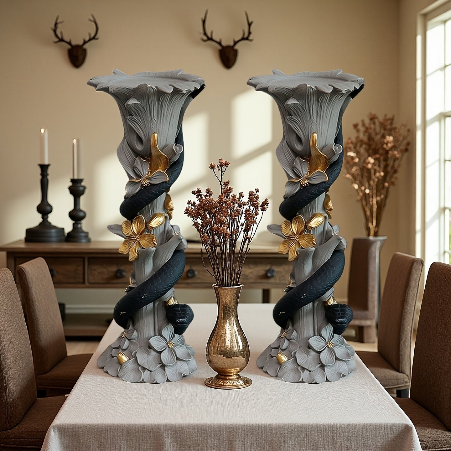 Decorative vases with floral designs on a table in a room with furniture and decor.