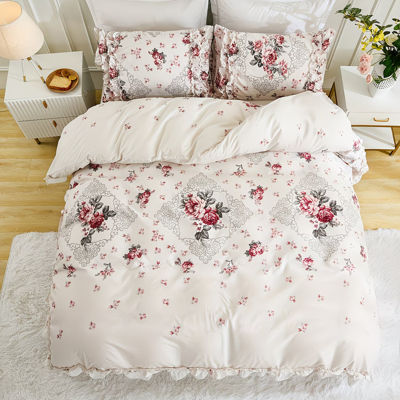 Floral patterned bedding set on a bed in a bedroom setting.
