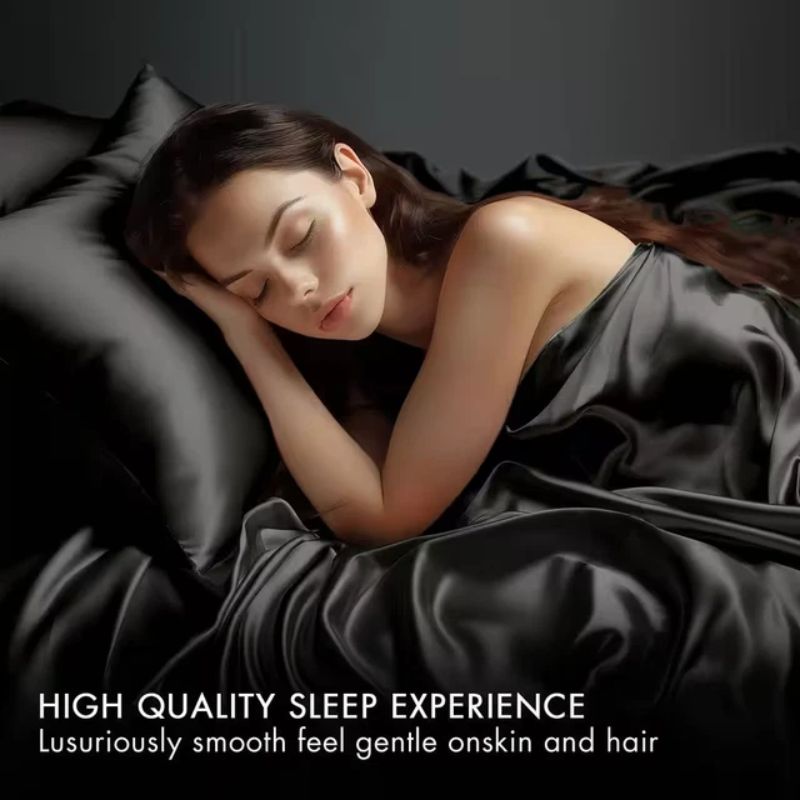 Woman sleeping under black satin sheets with text about high-quality sleep experience.