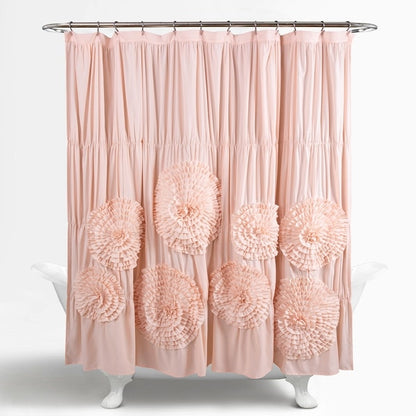 Pink shower curtain with floral patterns on a white background
