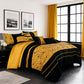 Yellow and black bedding set in a bedroom with yellow curtains and framed pictures on the wall.