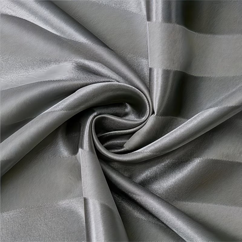 Close-up of gray fabric with folds