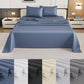 Blue bedspread on a bed with pillowcases, surrounded by color swatches.
