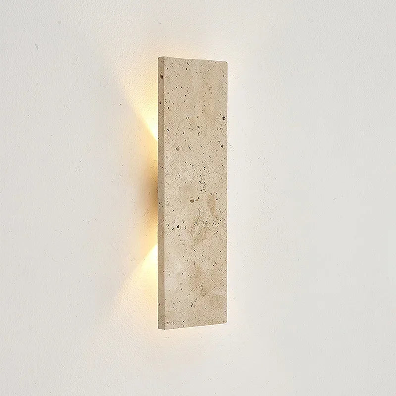 Rectangular wall light fixture on a white wall