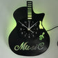 Guitar-shaped wall clock with 'Music' text and glowing green accents on a white background