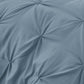 Close-up of pleated blue fabric