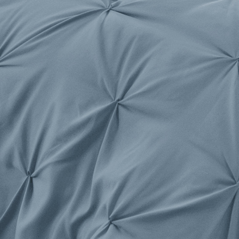 Close-up of pleated blue fabric