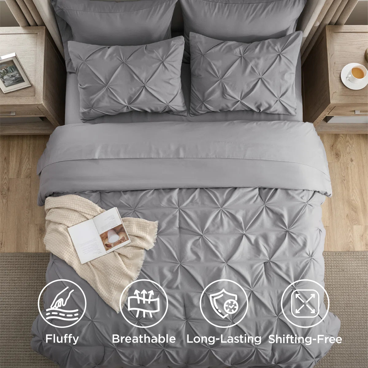 Gray quilted comforter set on a bed with visible features and benefits listed.