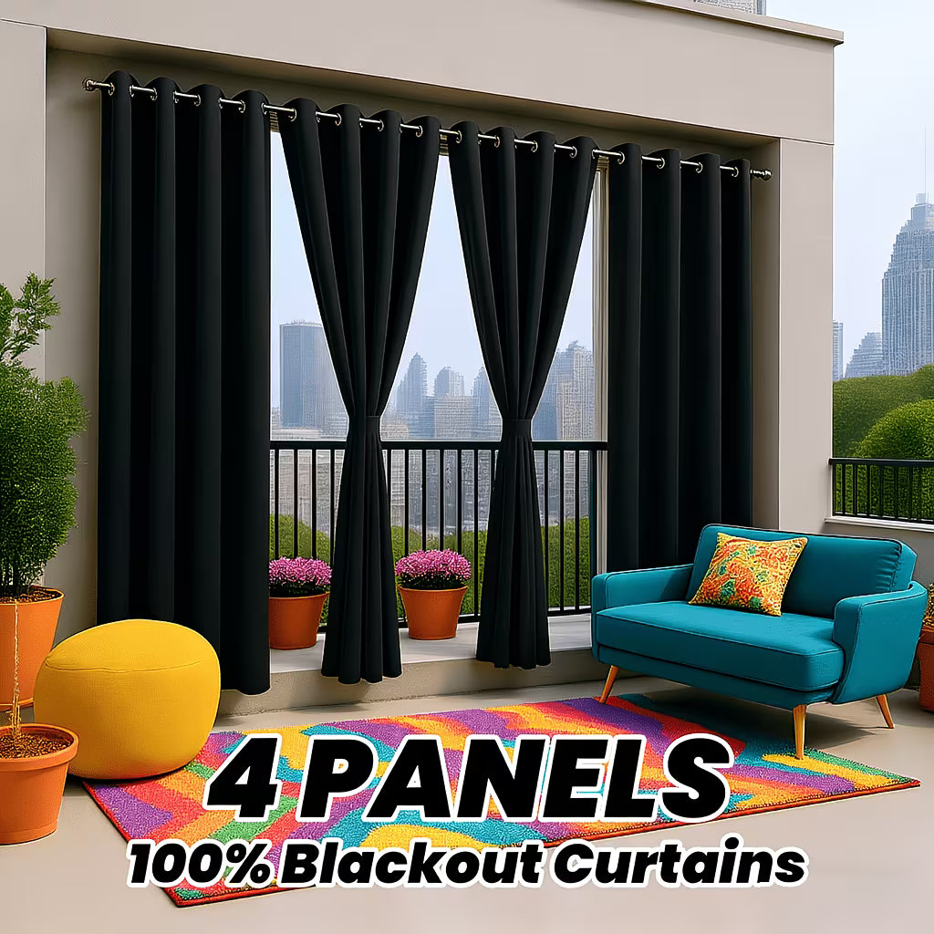 Blackout curtains on a balcony with a cityscape view, featuring a blue sofa and colorful rug.