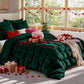 Decorative bedroom with green bedding, heart-shaped pillows