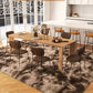 Dining area with a wooden table and chairs on a textured rug in a modern kitchen.