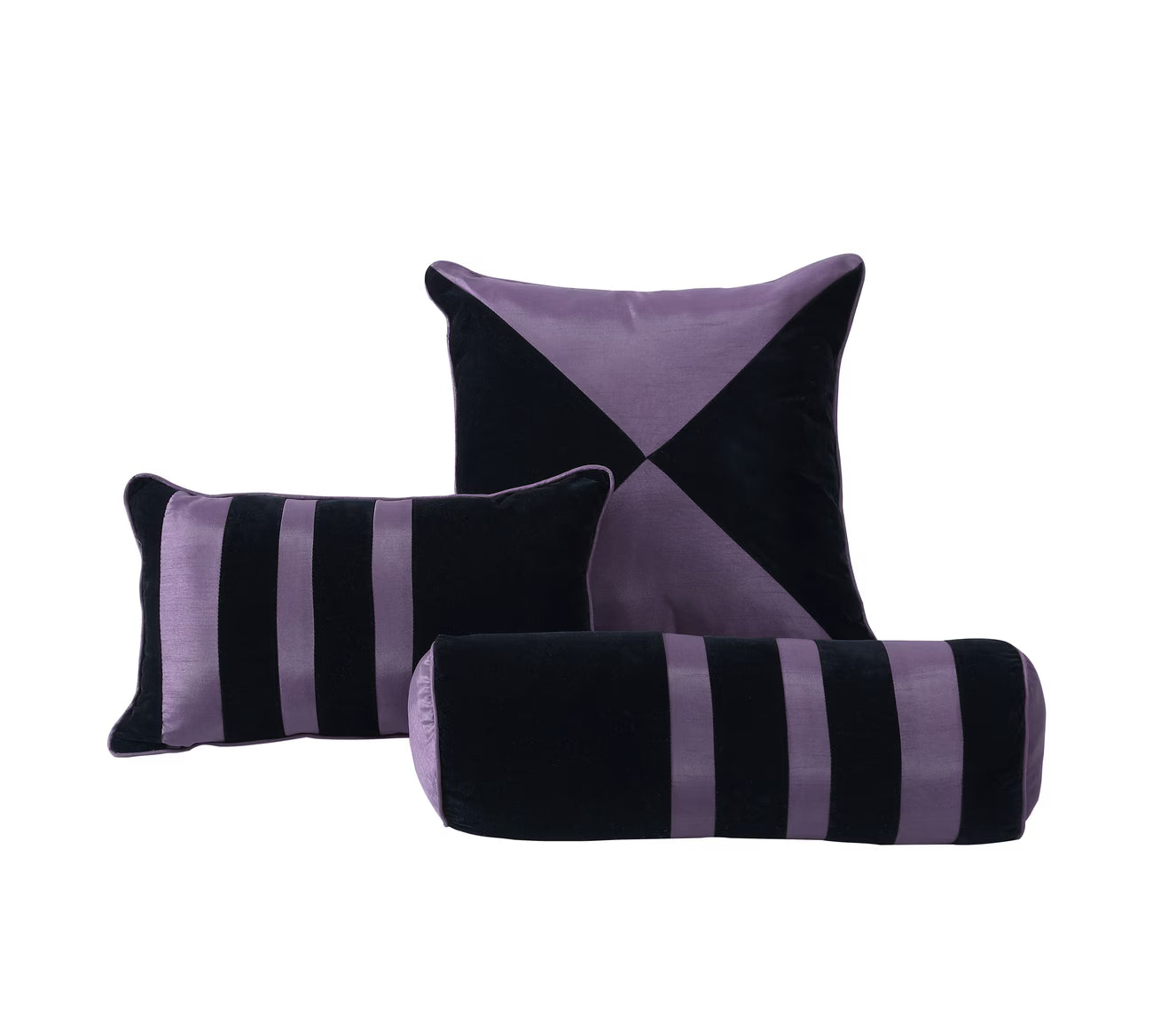 Set of black and purple pillows on a white background