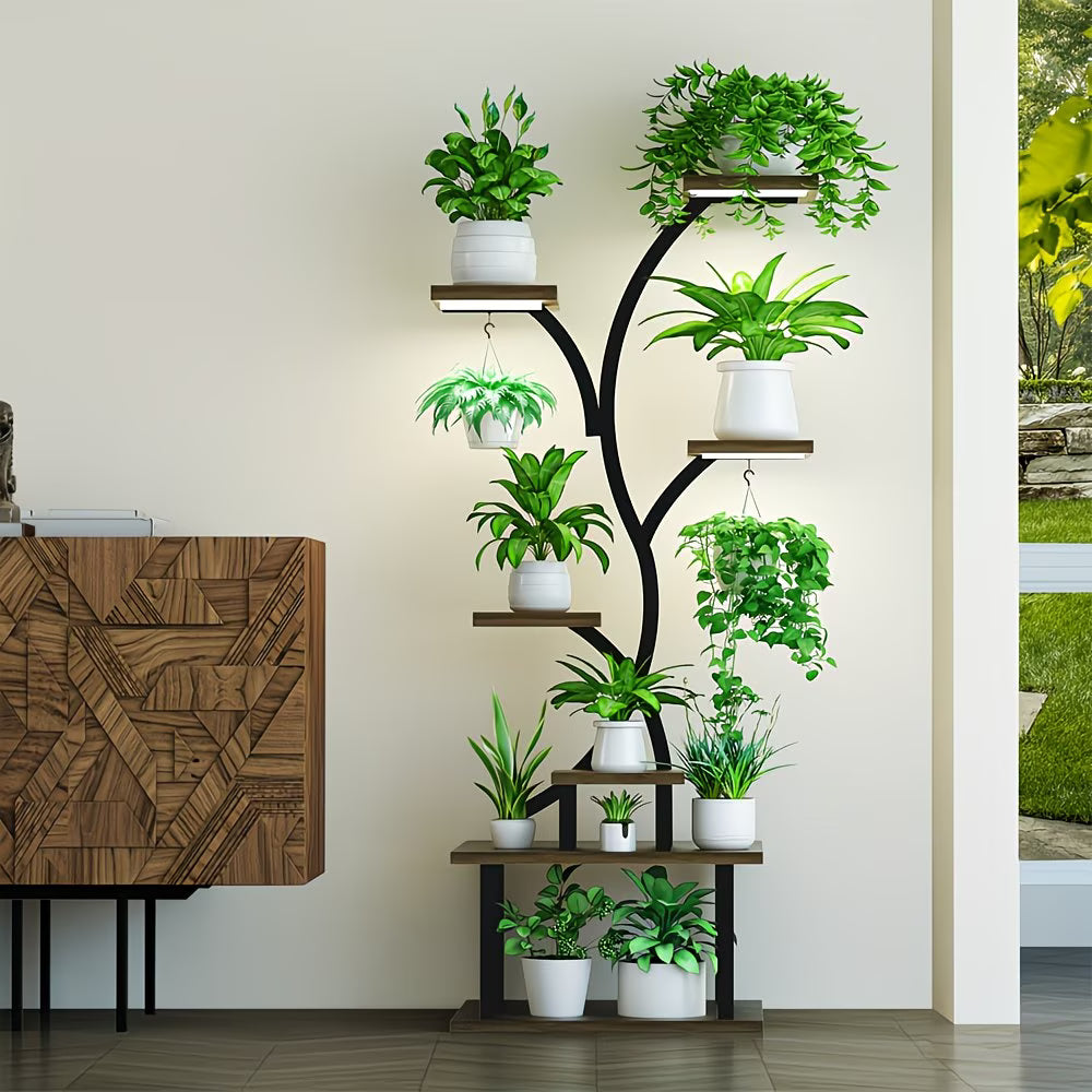 Decorative plant stand with various potted plants in a room setting.