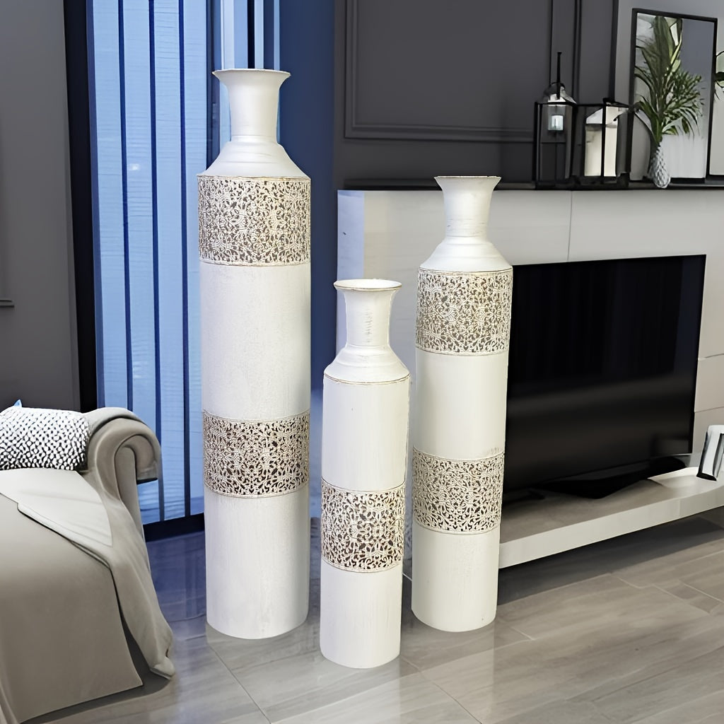 Three decorative vases with a modern interior setting