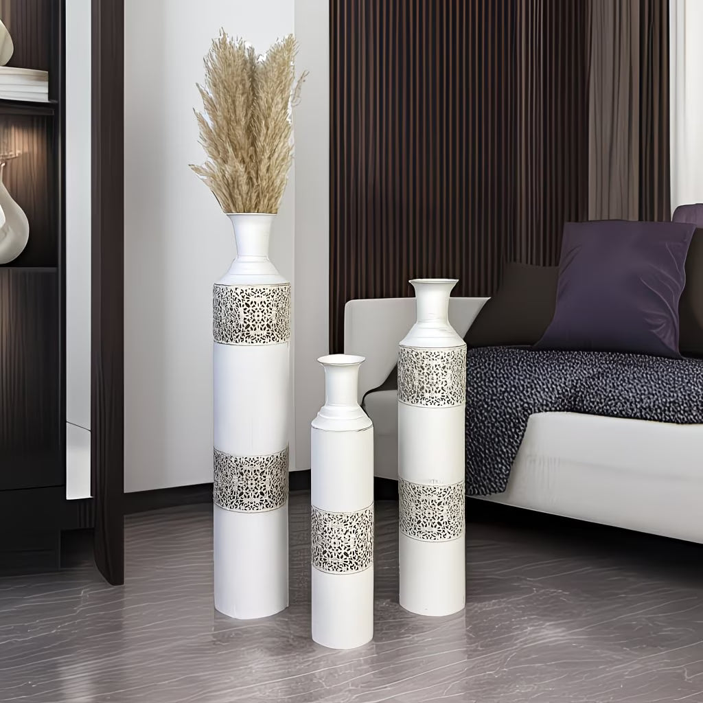 Decorative vases with patterned base in a living room setting