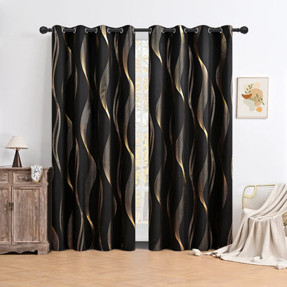 Black curtains with gold wavy patterns in a room setting.
