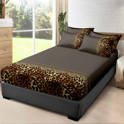 Bed with leopard print bedding in a bright bedroom
