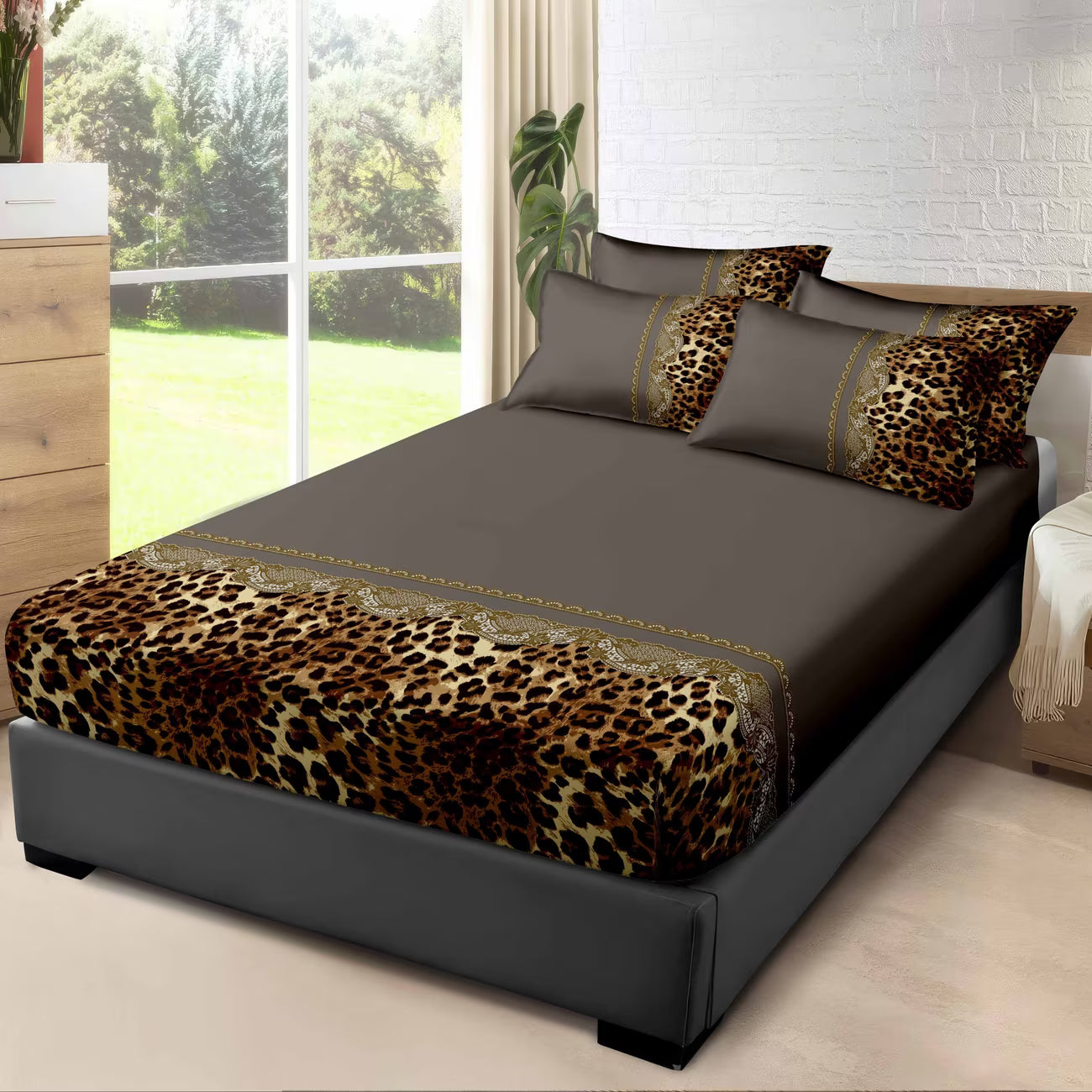 Bed with leopard print bedding in a bright bedroom