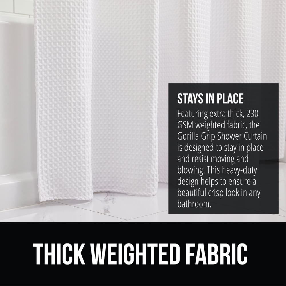 White shower curtain with text about thick weighted fabric and grip