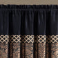 Black curtain with gold and brown decorative patterns